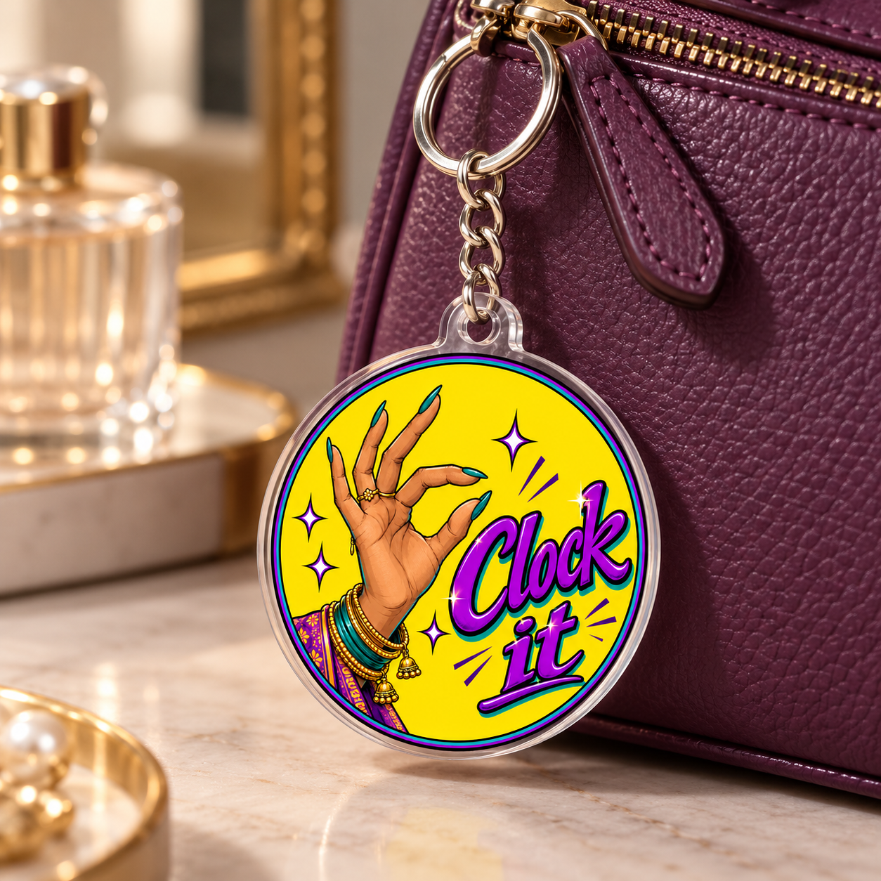 Clock It illustrated acrylic keychain attached to a purple tote