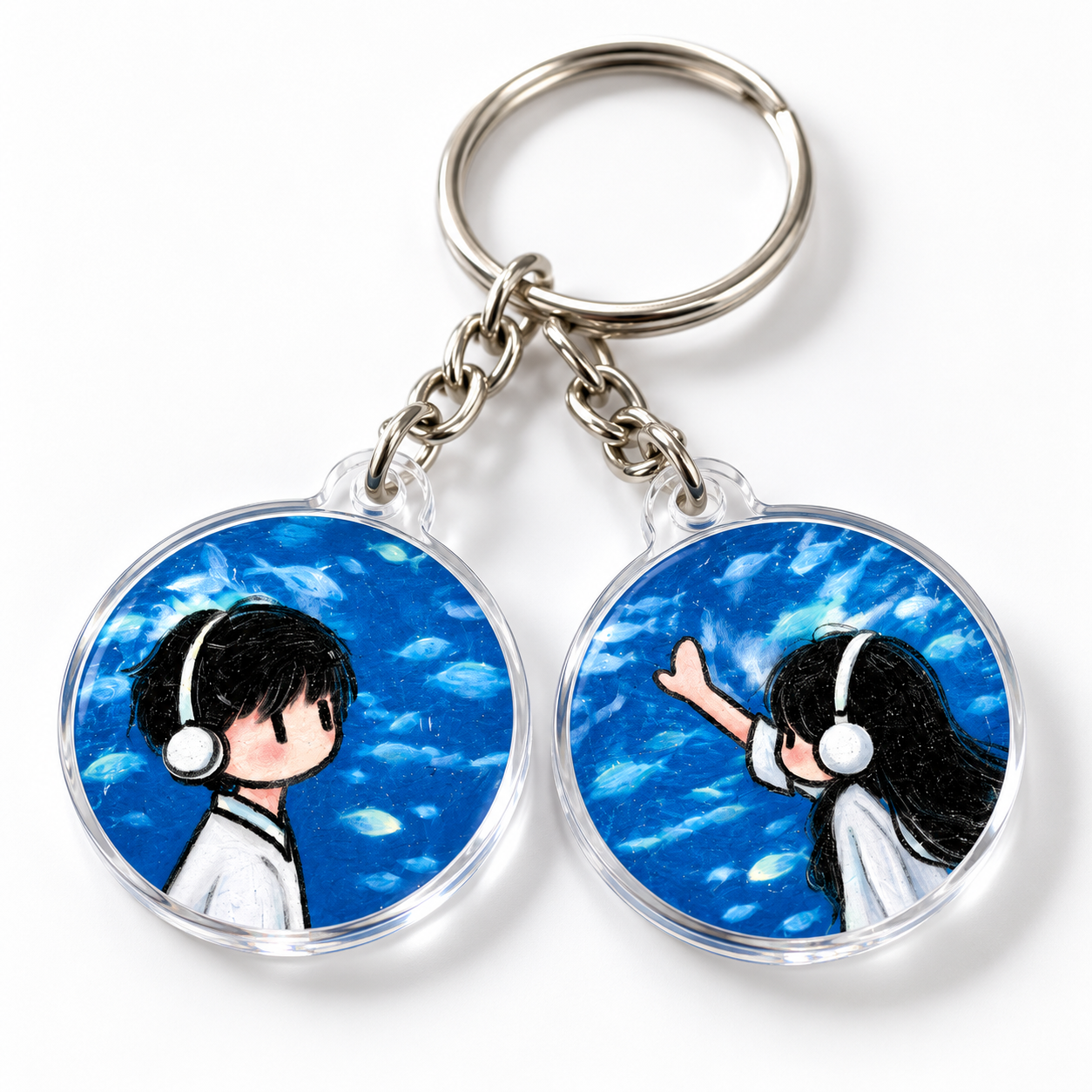 Two matching underwater portrait acrylic charms on one silver key ring